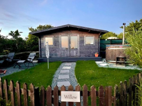 Willow Glamping Hut with HOT TUB, Ensuite, BBQ, Firepit, Views, Fenced Garden, Dog Friendly, Alpacas on site on Anglesey, North Wales